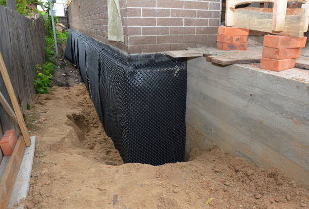 SJ Waterproofing Pros technician performing targeted Emergency Waterproofing assessment in La Grange, IL